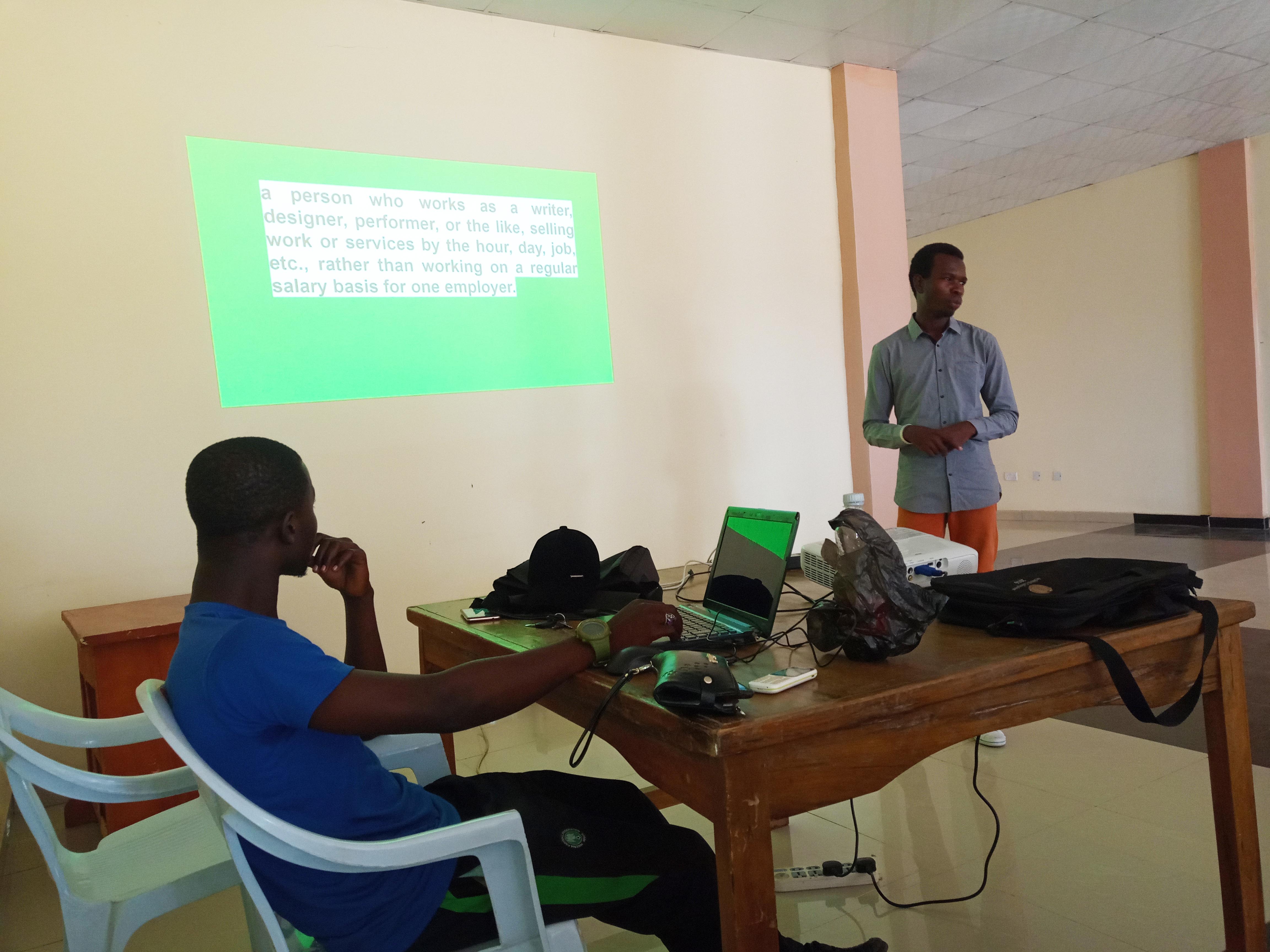 Facilitator presenting freelancing concepts at the workshop